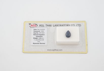 Pear-cut sapphire on paper, under seal.
Sapphire...