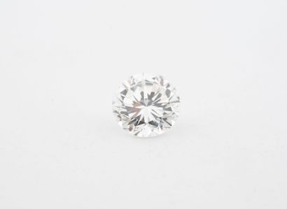 Brilliant-cut diamond on paper.
Weight: 1.68...