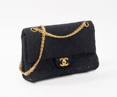 CHANEL
Classic bag with double flap in midnight...