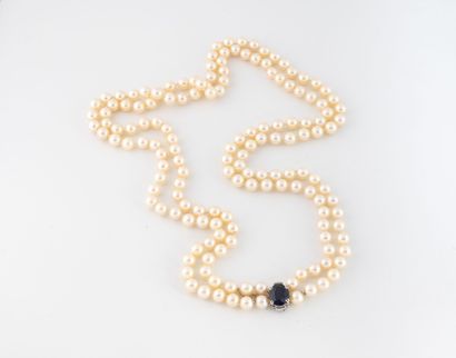 Two strands of cultured pearls, clasp set...