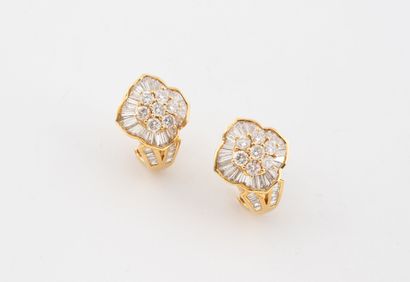 Pair of yellow gold (750) flower earrings...