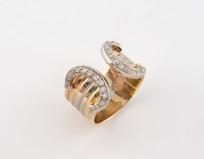 CARTIER
Three gold (750) ring, double C model,...