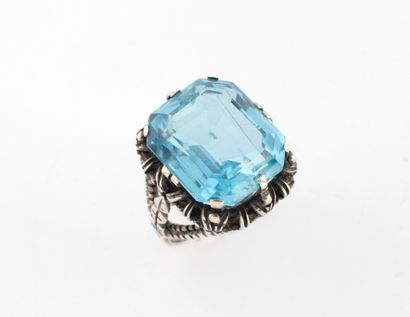 Ring set with a beautiful emerald-cut aquamarine...