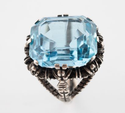 Ring set with a beautiful emerald-cut aquamarine...