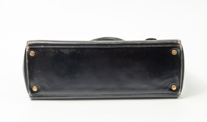 HERMES
32 cm Kelly bag in black box calfskin.
Black...