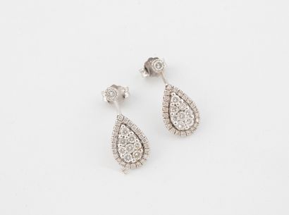 Pair of drop-shaped earrings in white gold...