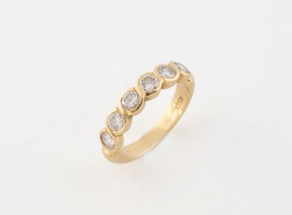 Half-American wedding band in yellow gold...