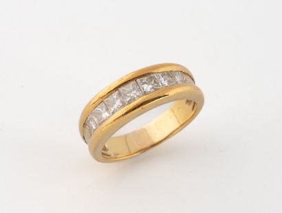 Yellow gold (750) ring paved with rail-set...