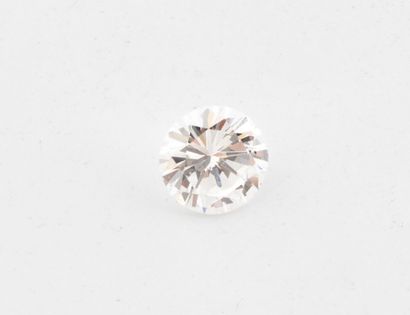 Brilliant-cut diamond on paper
Weight : 0.98...