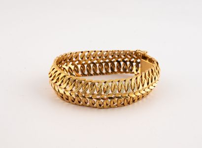 Bracelet en or jaune (750) à maille gourmette...