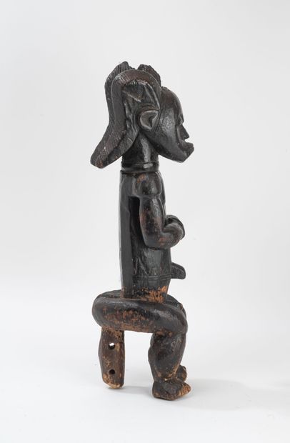 GABON
Figure of a man in carved wood with...