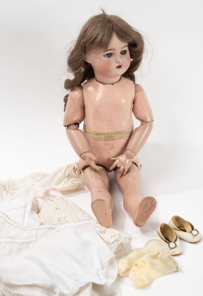 SFBJ
Walking doll, porcelain head, marked...
