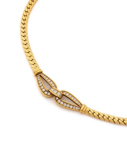 CARTIER
Collier ras de cou en or jaune (750)...