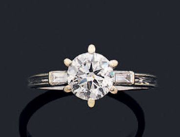 Bague en or gris (750) ornée d'un diamant...