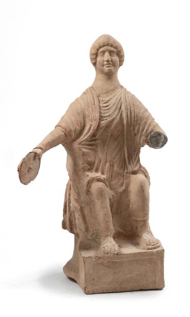 ROMAN TIME
Large statue of a woman wearing...