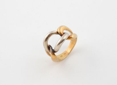 Bague or jaune et gris (750), le chaton formé...