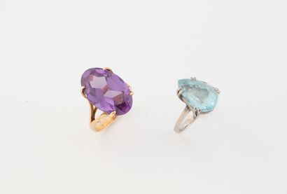 Lot of two pink and white gold (750) AC rings...