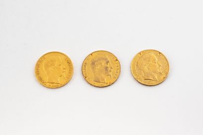 Lot de trois pièces de 20 francs or. Napoléon...