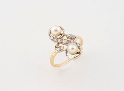 Yellow and white gold (750) ring, the bezel...