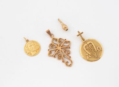 Lot of four yellow gold (750) pendants including...