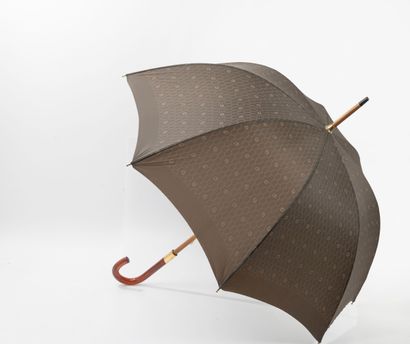 DIOR
Chocolate monogrammed canvas umbrella.
Signed...