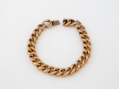 Bracelet gourmette en or jaune (750) à maille...