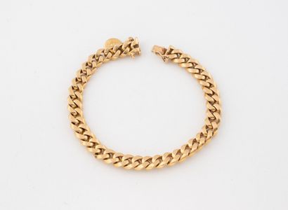Bracelet à mailles gourmette limée en or...