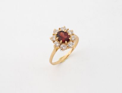 Bague marguerite en or jaune (750) centrée...