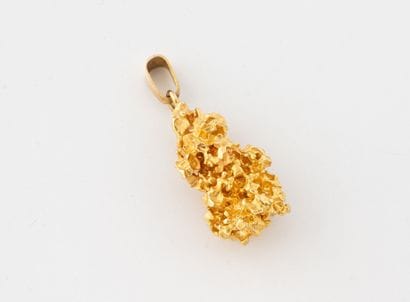 Pendentif pépite d'or libre jaune (750)....