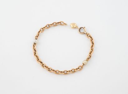 Bracelet en or jaune (750) à maille forçat...
