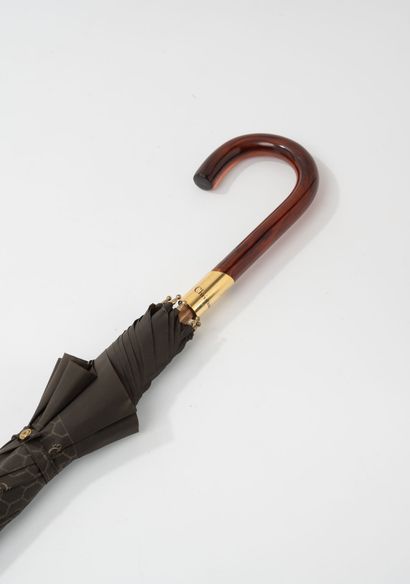 DIOR
Chocolate monogrammed canvas umbrella.
Signed...