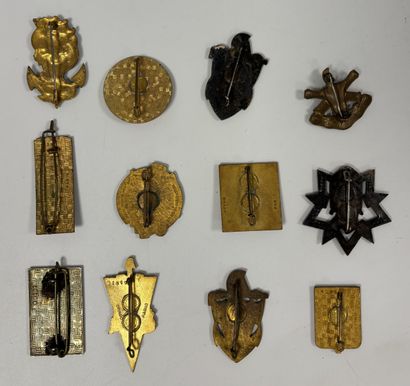 GENIE
Lot of 12 enameled metal badges. 
Small...