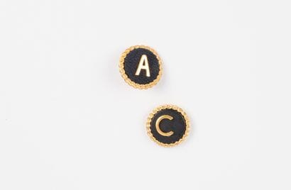 attributed to CHANEL, Paris
Two gilded metal...