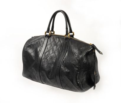 CHANEL
Sac de voyage de forme polochon en...