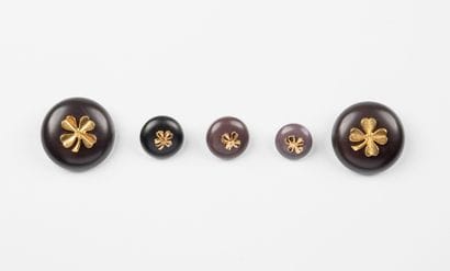 attributed to CHANEL, Paris
Five buttons...
