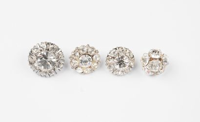 attributed to CHANEL, Paris
Four metal buttons...