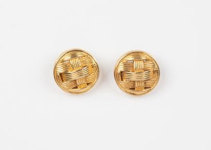 CHANEL, Paris
Two gilt metal buttons with...