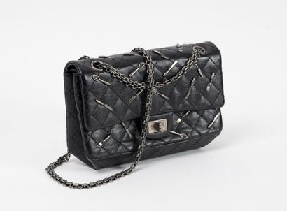 CHANEL, Paris
Sac 2.55 à double rabats en...