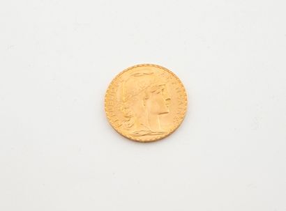 Pièce en de 20 francs or au coq, 1912.
Poids...