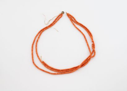 Necklace of three strands of orange coral...