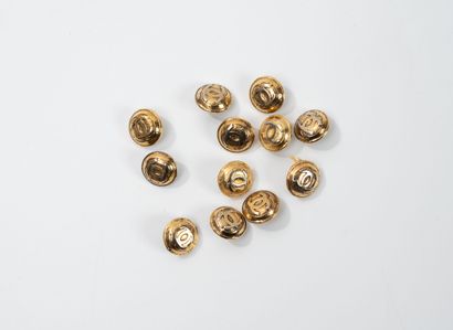 CHANEL 12 small gilded metal buttons, signed,...