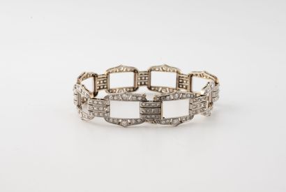 Articulated bracelet in white and yellow...