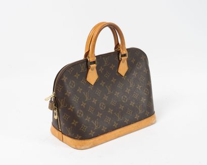 Louis VUITTON
Alma handbag in Monogram canvas...