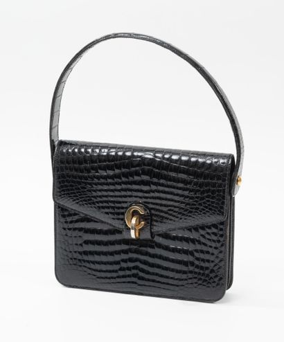Christian DIOR
Small handbag in black imitation...