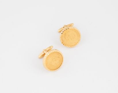 Pair of yellow gold (750) cufflinks set with...