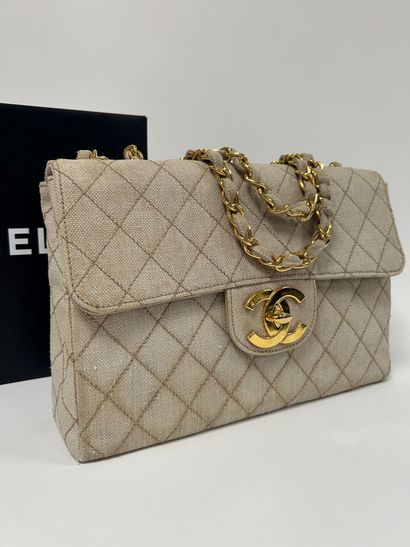 CHANEL Classique Jumbo bag with flap in natural...