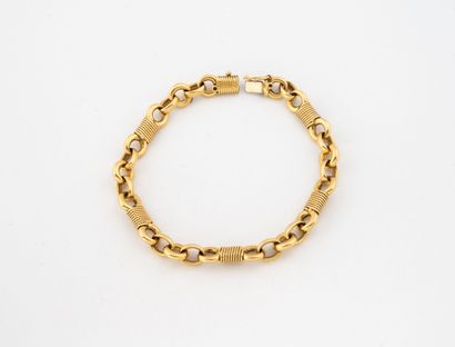 Yellow gold (750) bracelet with jaseron mesh...