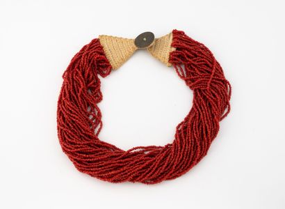 Choker necklace made of many rows of small...