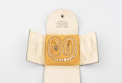 Necklace of tumbling white cultured pearls,...