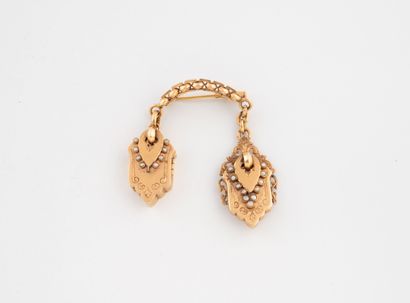 Yellow gold (750) brooch with watch chain...
